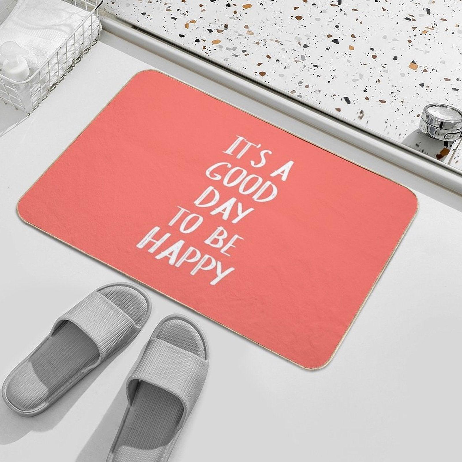 It's A Good Day to Be Happy in Coral Bath Mat