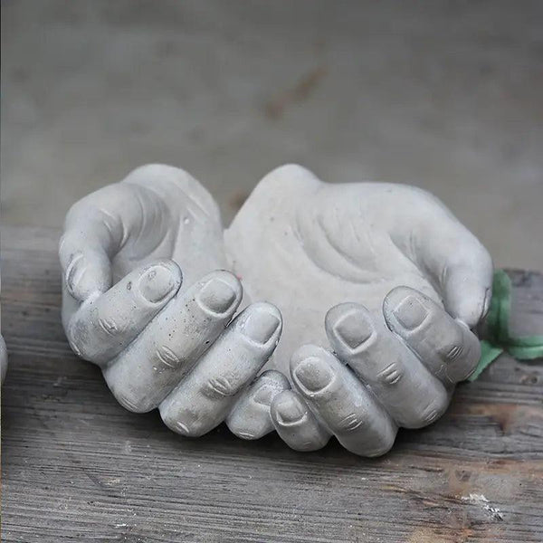 Hand-Shaped Concrete Planters