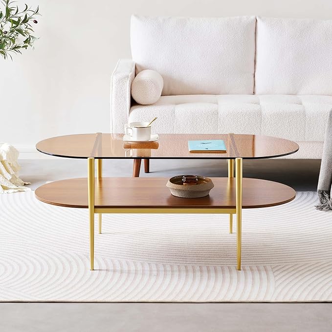 Oval Glass Coffee Table, Mid-Century Modern Design, L41 x W21 x H17 inch, for Living Room, 2-Tier Structure, Amber Glass Top and Walnut Finish Wood Shelf, Conical Legs with Gold Finish Frame