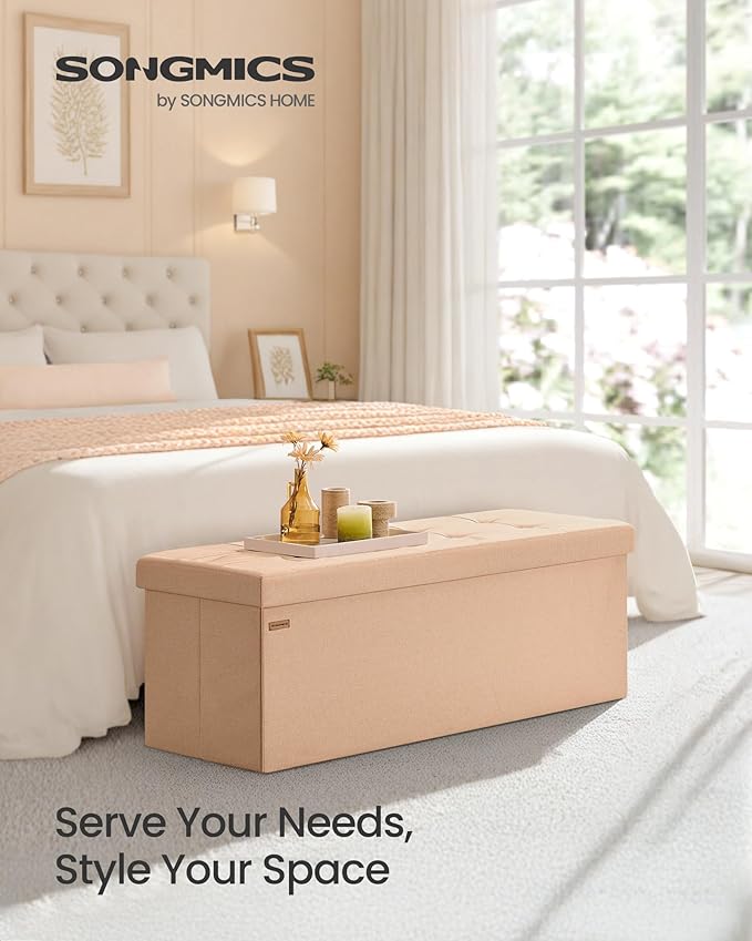 SONGMICS Mazie Collection - Storage Ottoman Bench, 43 Inches Folding Foot Rest Stool, End of Bed Bench, Easy Assembly, for Living Room, Bedroom, Entryway, Apricot Orange ULSF077O01