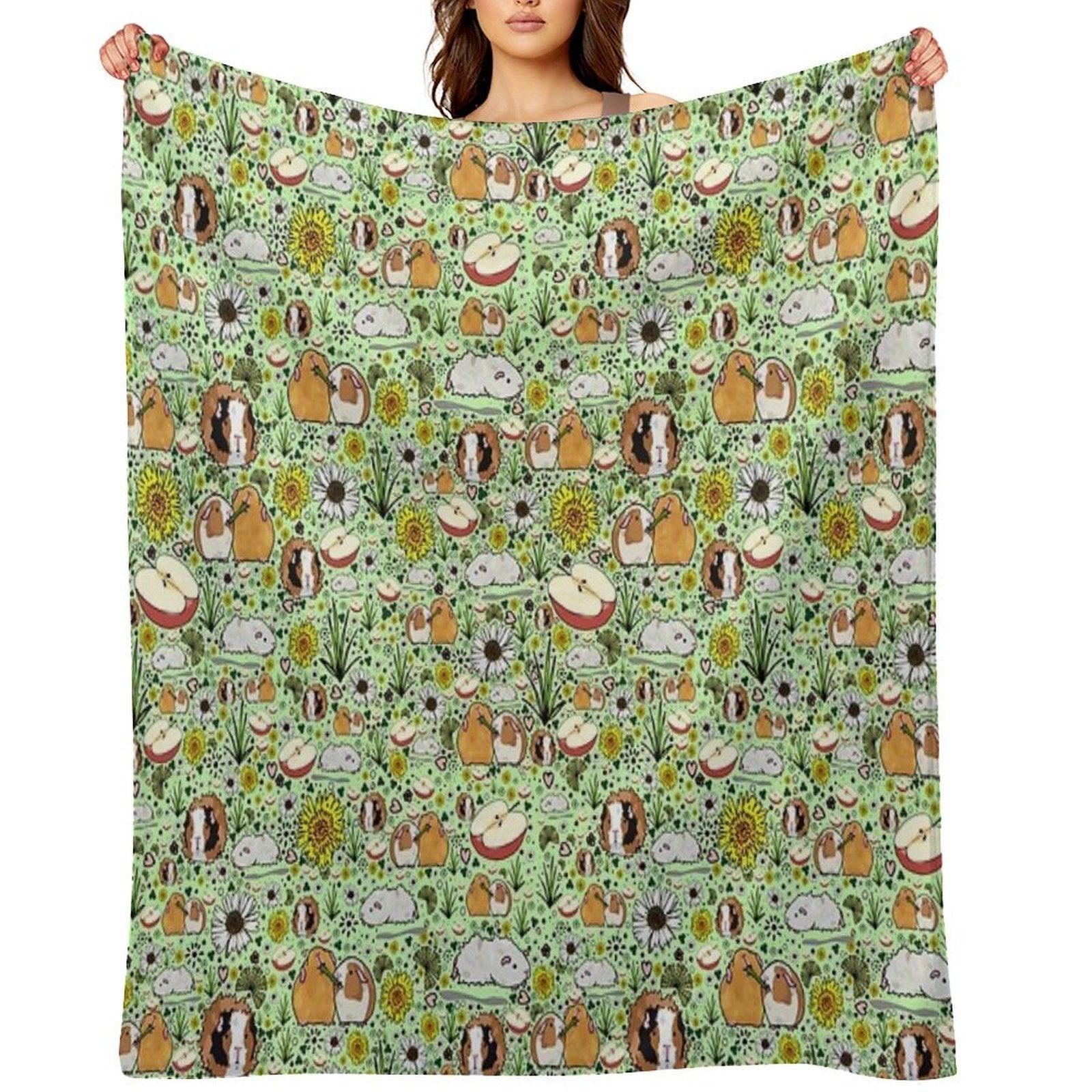 Guinea Pigs in Green Throw Blanket