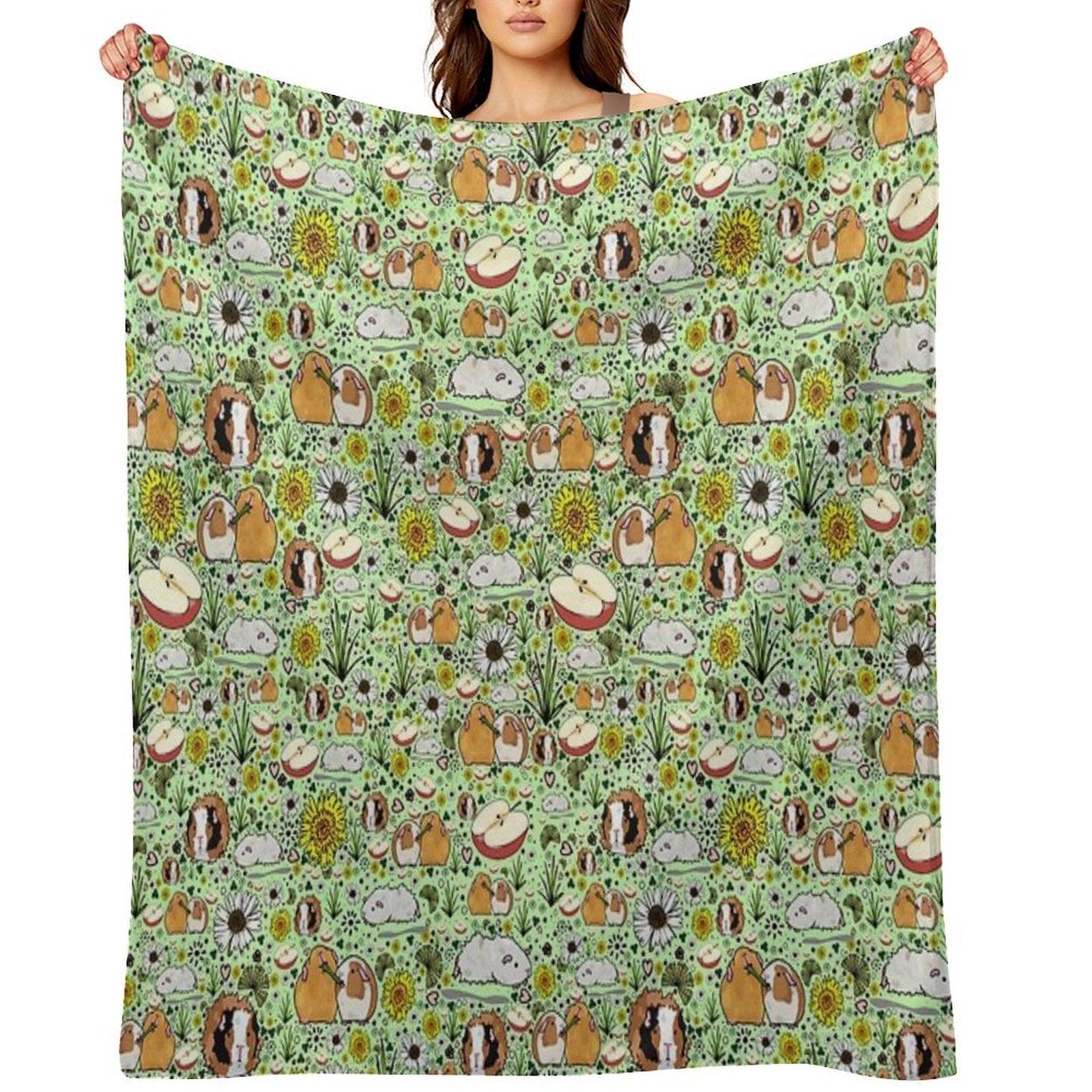 Guinea Pigs in Green Throw Blanket
