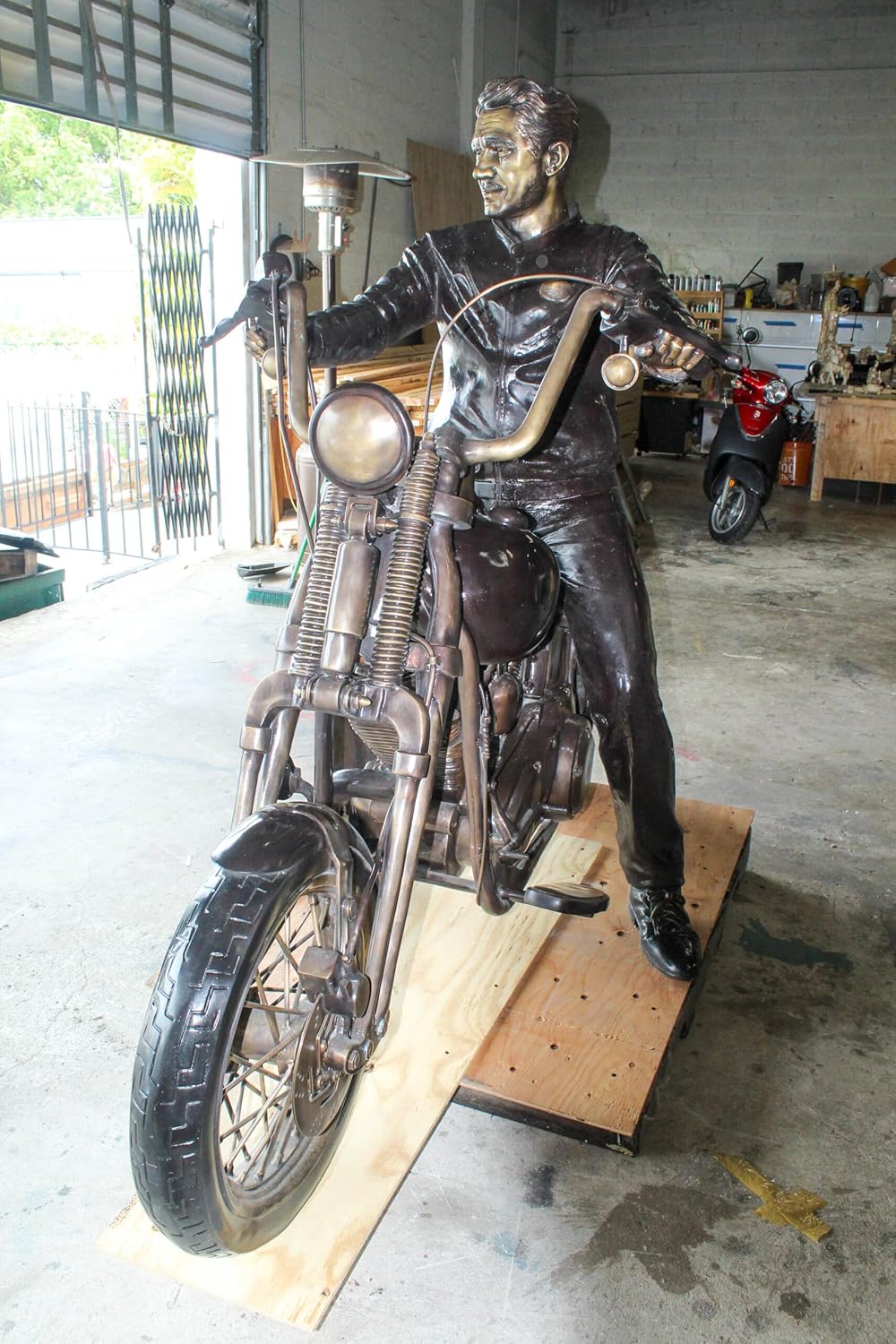 Bronze Sculpture of Man on His Motorcycle Life Size 
 94