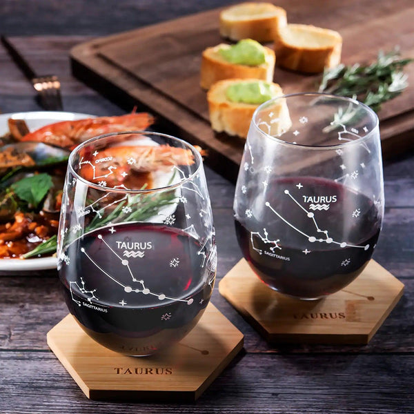 Set of 2 Zodiac Sign Wine Glasses with 2 Wooden Coasters by The Wine Savant - Astrology Drinking Glass Set with Etched Constellation Tumblers for Juice, Water Home Bar Horoscope Gifts 18oz (Taurus)