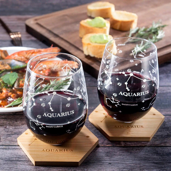 Set of 2 Zodiac Sign Wine Glasses with 2 Wooden Coasters by The Wine Savant - Astrology Drinking Glass Set with Etched Constellation Tumblers for Juice, Water Home Bar Horoscope Gifts 18oz (Aquarius)