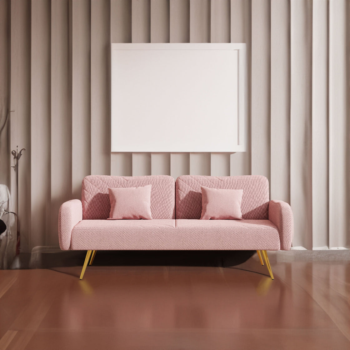 Pink sofa with gold legs in a room with beige walls and wooden floor.