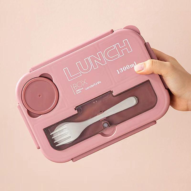 Microwaveable sealed lunch box with compartments and sauce box with cutlery