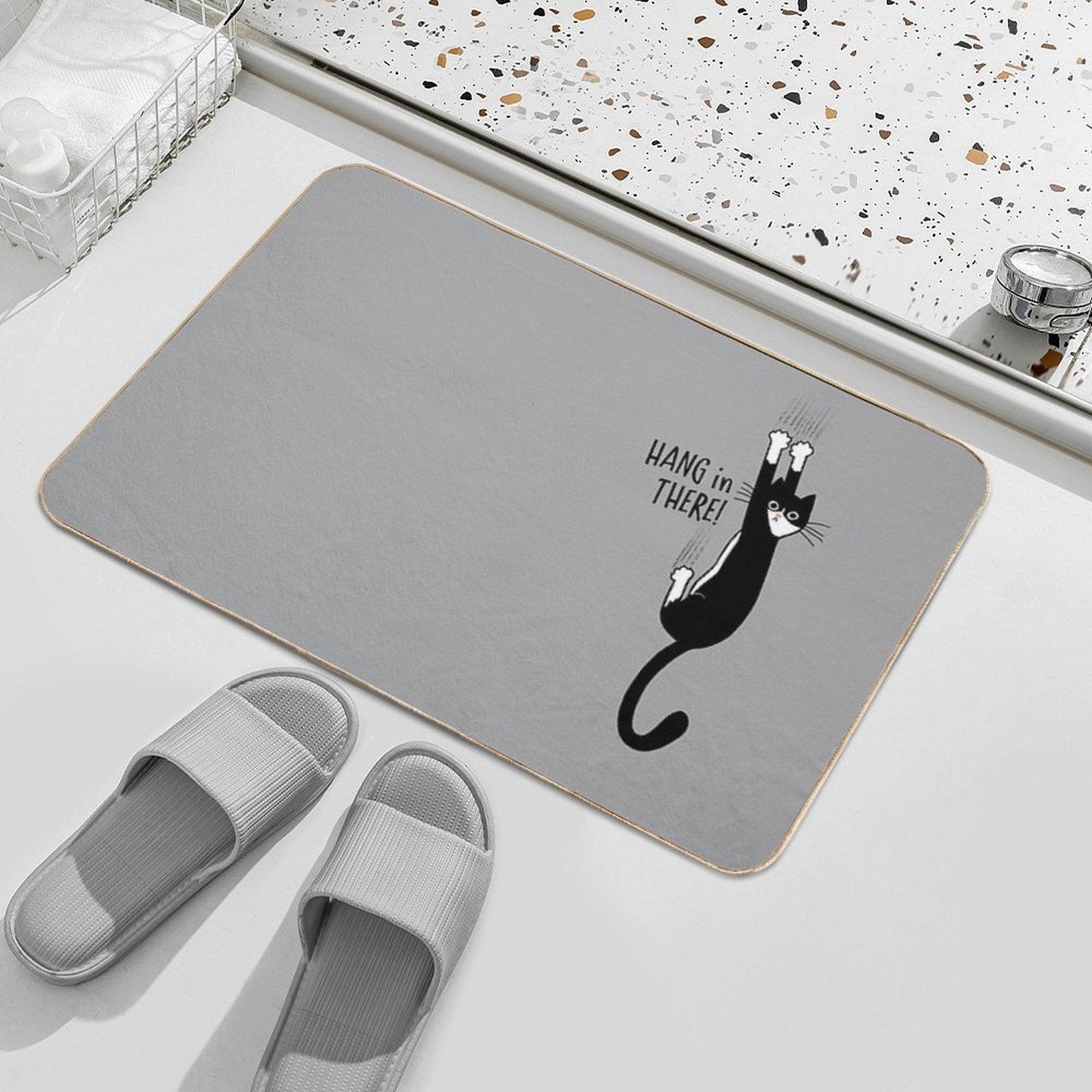 Tuxedo Cat Hanging On Hang In There! Funny Cat Hanging On With Claws  Long-Lasting Bath Mat