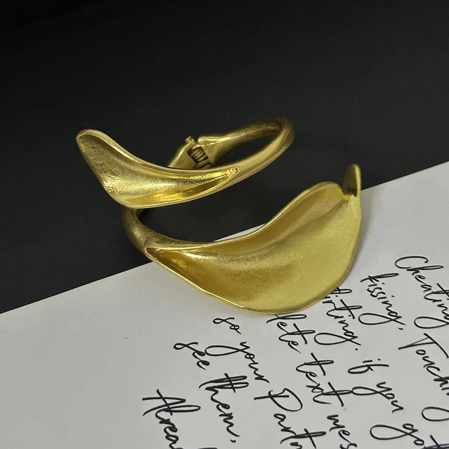 Metal leaf shaped flower bracelet bracelet