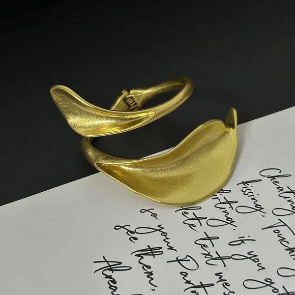 Metal leaf shaped flower bracelet bracelet