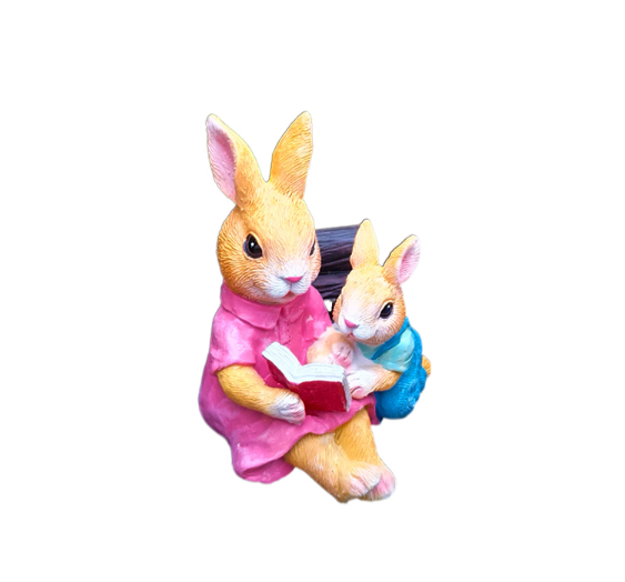 Simulated rabbit reading animal ornament