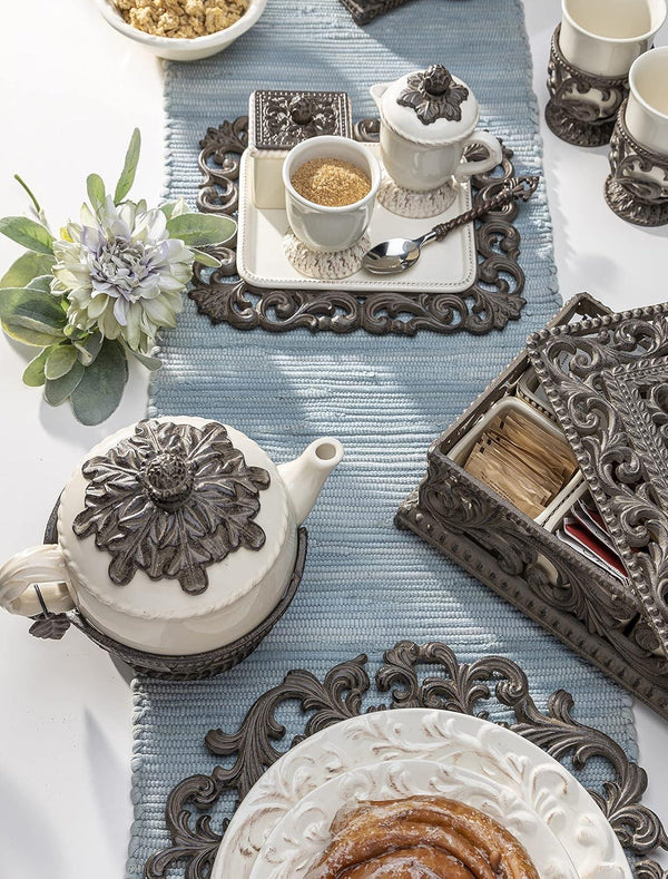 Cream Stoneware Teapot with Metal Acanthus Leaf Holder. -- Size: 9.5