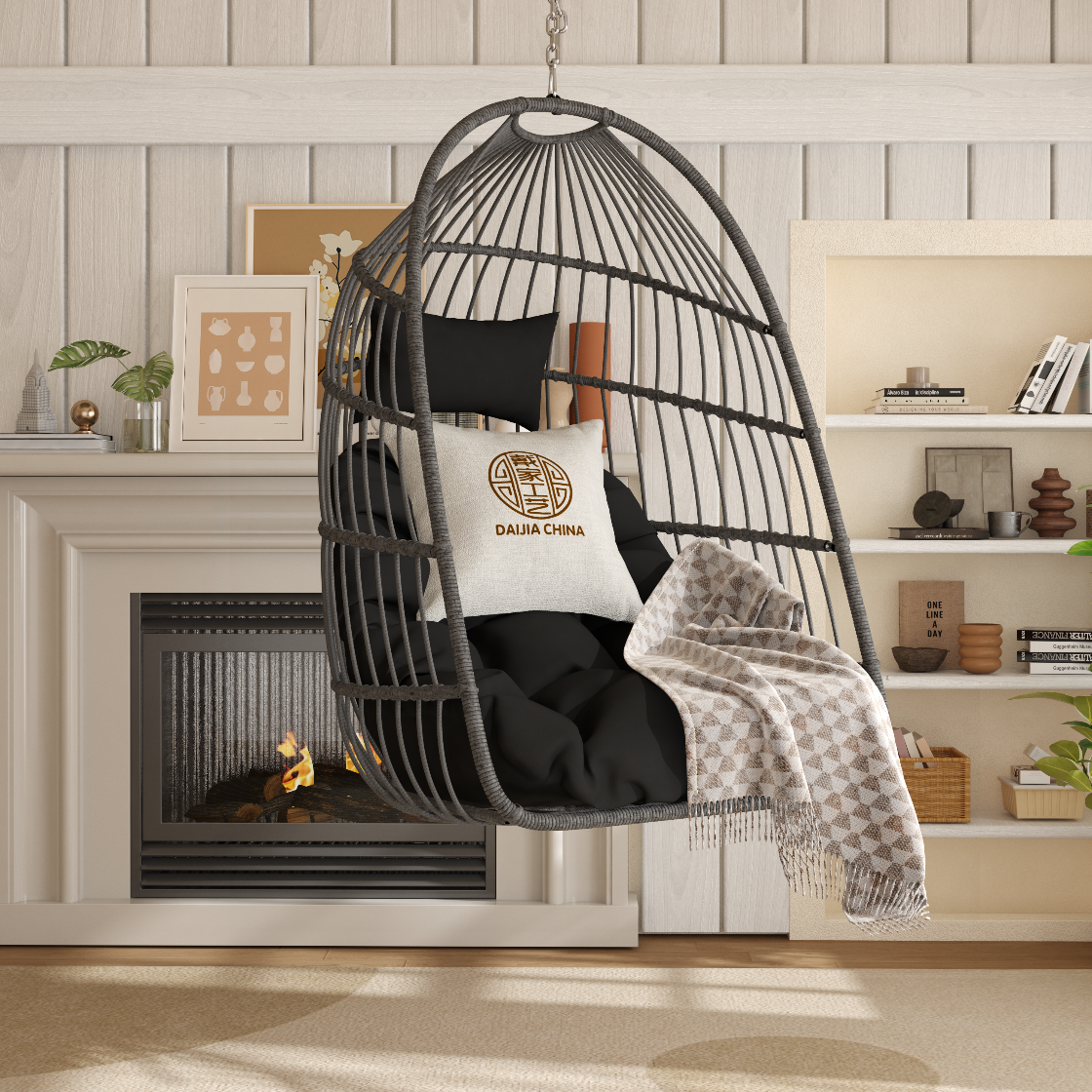 Hanging egg-shaped chair with a pillow and blanket in a cozy living room.