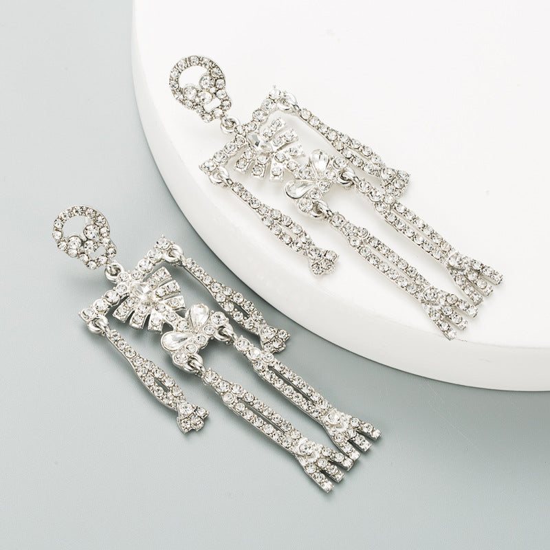 European and American style skull skeleton alloy inlaid rhinestone earrings female personality long exaggerated earrings earrings