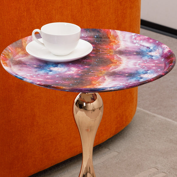 Close-up of galaxy-themed tabletop on Mermaid Tail End Coffee Table Round Side, showcasing vivid cosmic colors and smooth finish by Buddify.