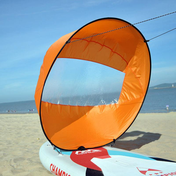 42-inch SUP/water sports accessories: sail, paddles, surf gear.