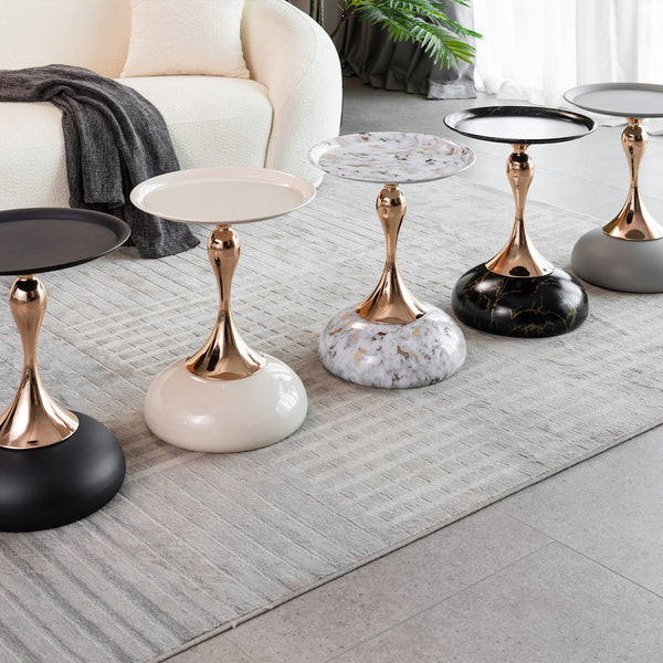 Lineup of Mermaid Tail End Coffee Tables in various finishes including black, white, marble, and gray, highlighting modern accent table options.