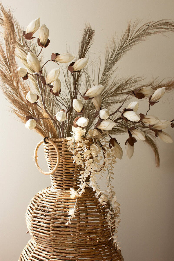 SET OF THREE WOVEN SEAGRASS AND IRON FLOOR VASES