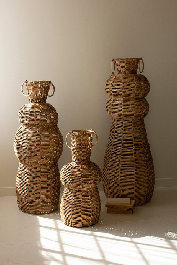 SET OF THREE WOVEN SEAGRASS AND IRON FLOOR VASES