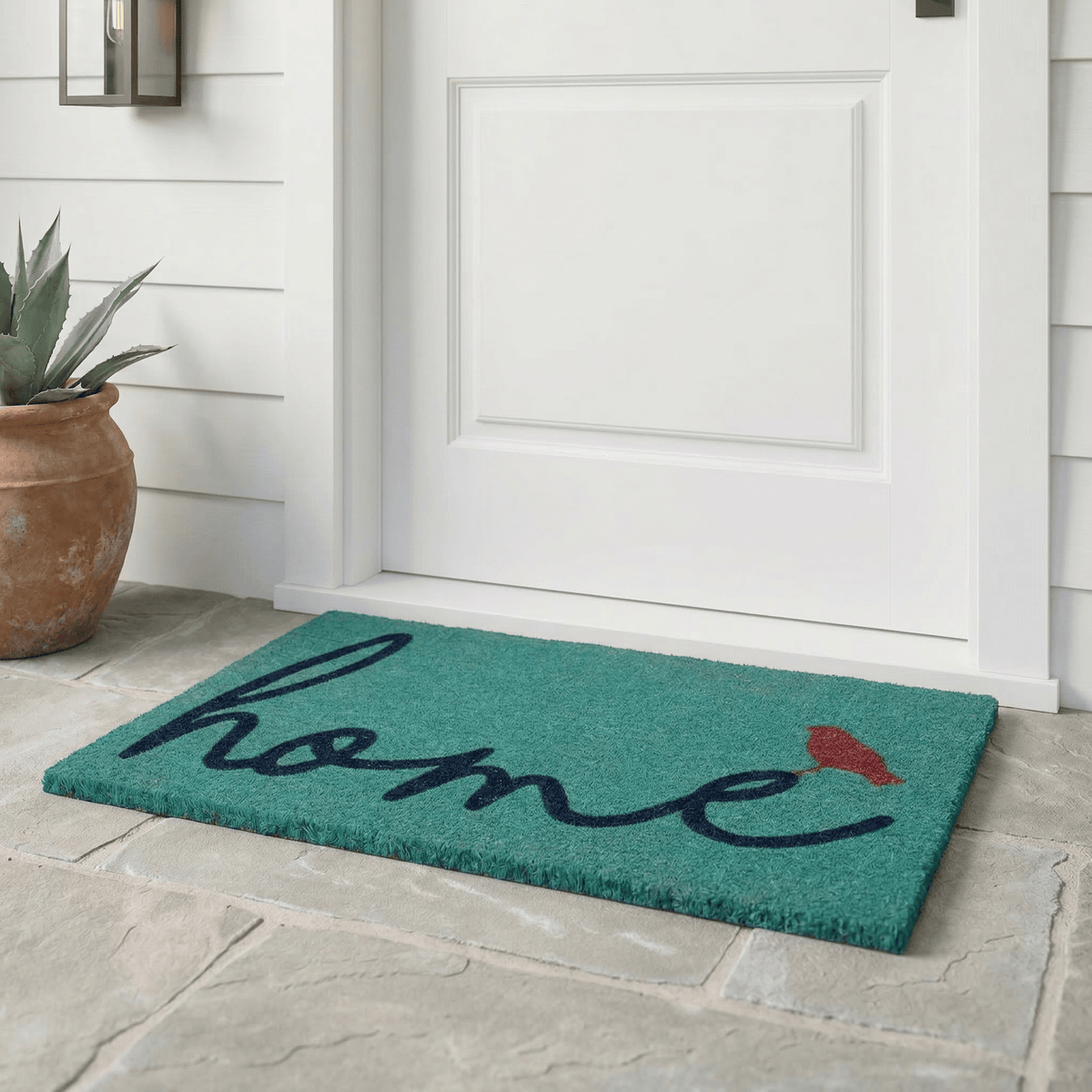 A Bird Perched on Home Coir Doormat