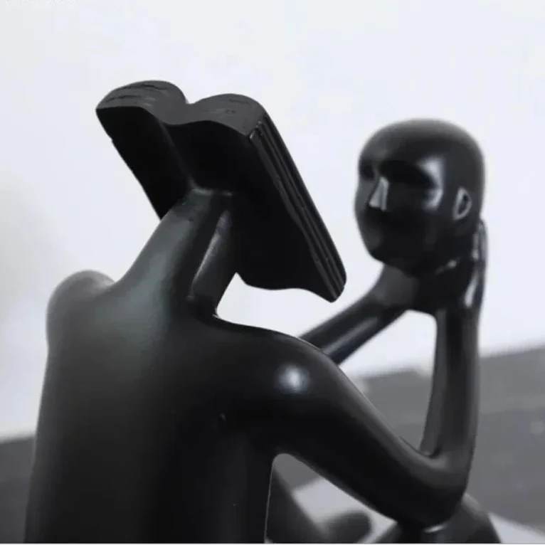 Abstract Seated Figure Sculpture Holding a Head