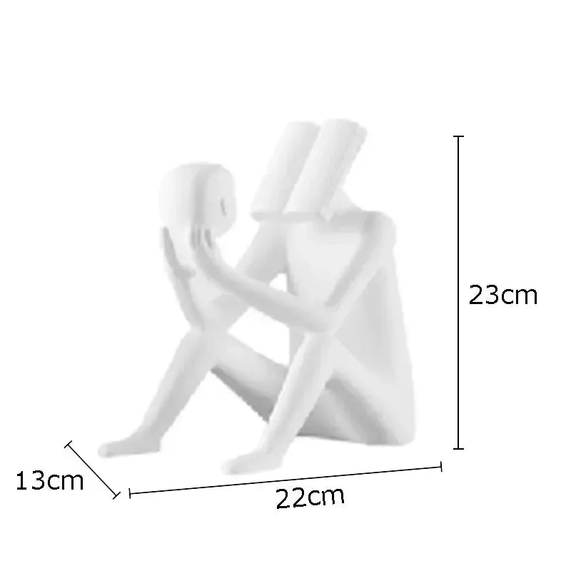 Abstract Seated Figure Sculpture Holding a Head