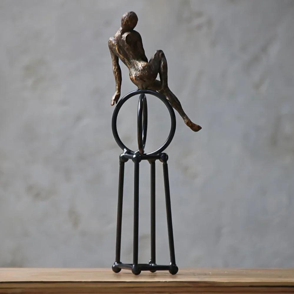 Abstract Seated Figure Sculpture on Geometric Stand – Modern Iron Table Decor