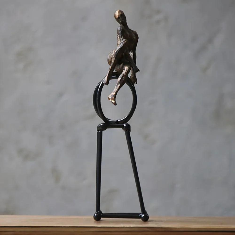Abstract Seated Figure Sculpture on Geometric Stand – Modern Iron Table Decor