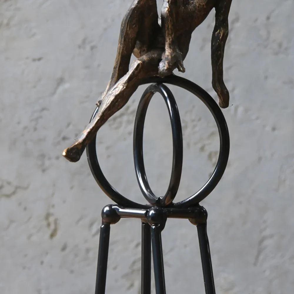 Abstract Seated Figure Sculpture on Geometric Stand – Modern Iron Table Decor
