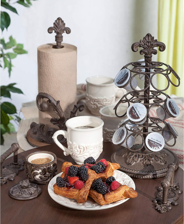 Acanthus Cast Aluminum Coffee Pod Holder by GG Collection. Breakfast scene with waffles, berries, coffee, and decorative metal items on a table.