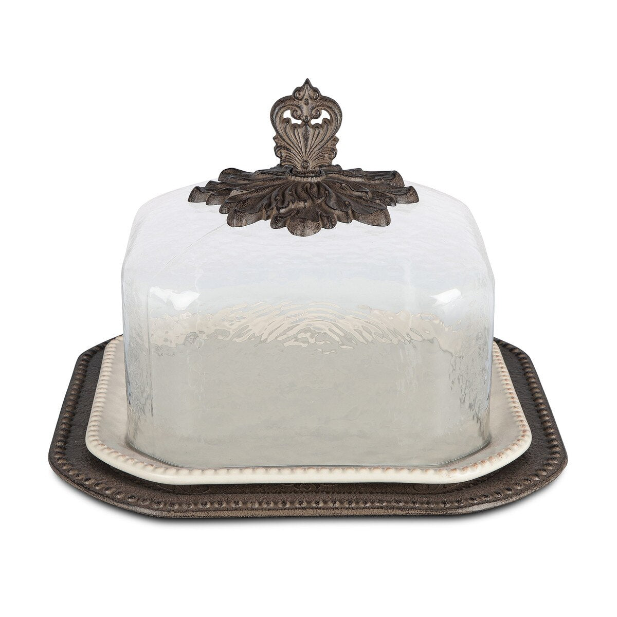 Acanthus Stoneware Pastry Keeper. Decorative glass cake stand with ornate metal top on a white background