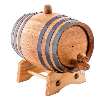Wooden barrel with metal bands on a white background