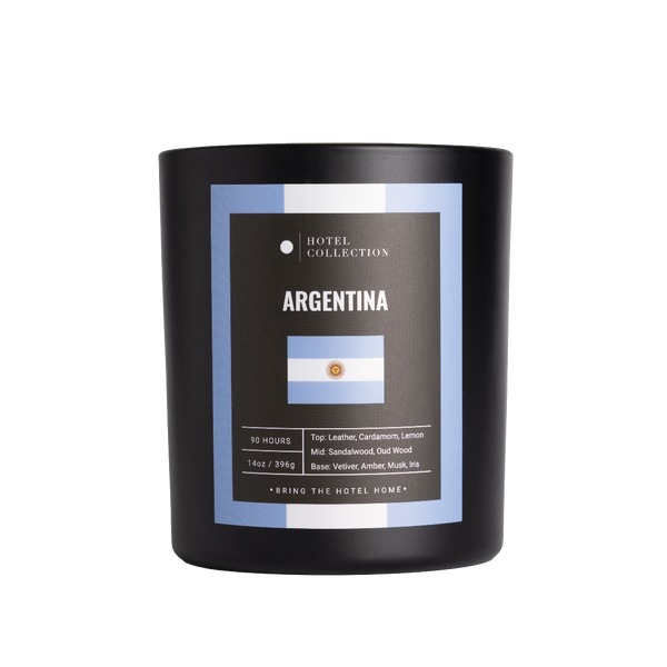 Black candle with 'Hotel Collection' label and 'Argentina' design on a white background