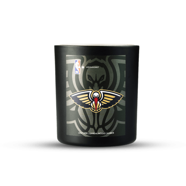 Black candle with a logo on a white background