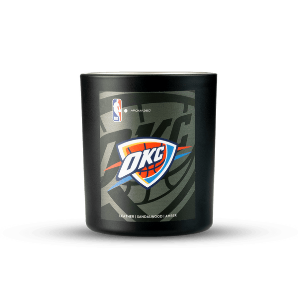 Black candle with Oklahoma City Thunder logo on a white background