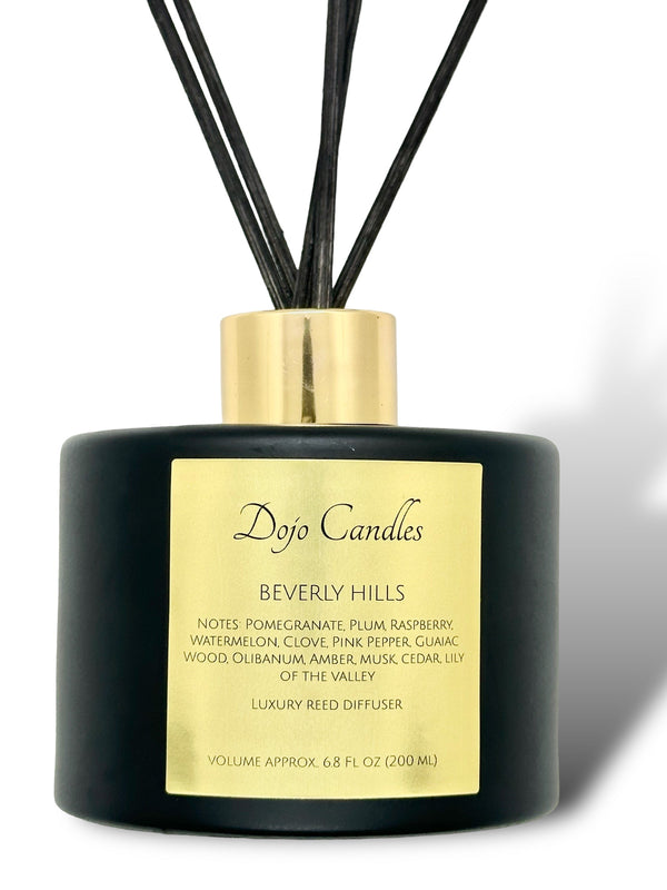 Doó Candles Beverly Hills reed diffuser with black sticks on a white background