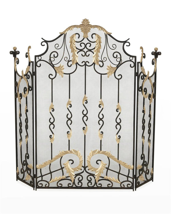 Decorative fireplace screen with intricate gold and black design on a white background