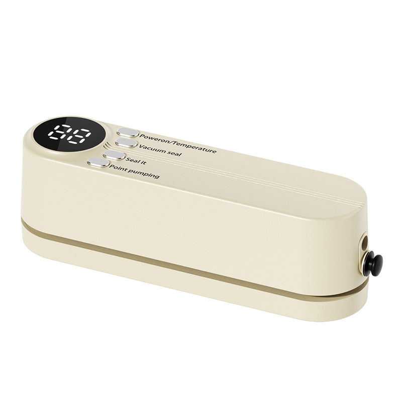 Beige cordless 3 - in - 1 food sealer. For dry/moist food, 4 bags. Seals chip bags, inflates items.