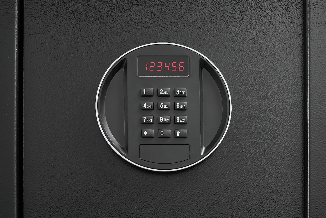 Digital keypad on a black safe door