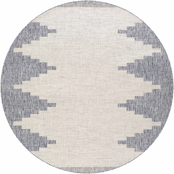 Round rug with geometric pattern on a white background