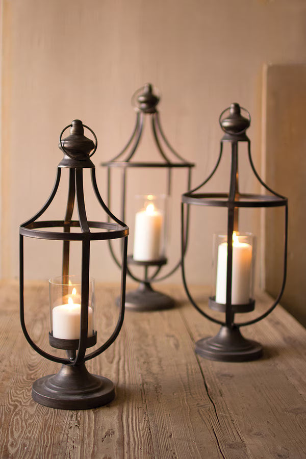 SET OF THREE METAL LANTERNS WITH GLASS INSERT
