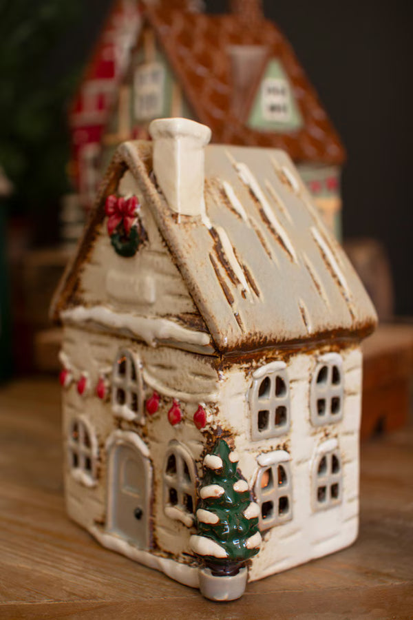 SET OF FOUR CERAMIC CHRISTMAS VILLAGE