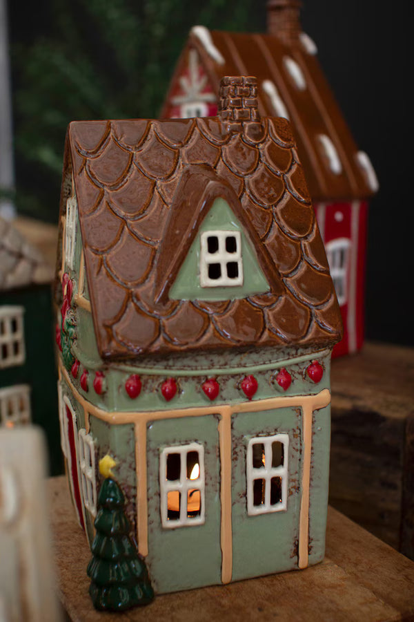 SET OF FOUR CERAMIC CHRISTMAS VILLAGE