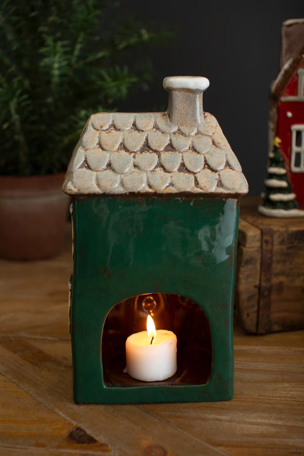 SET OF FOUR CERAMIC CHRISTMAS VILLAGE