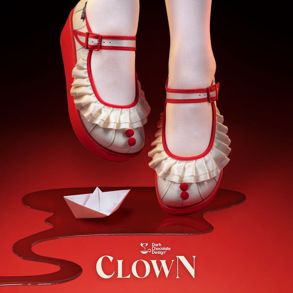 Red and white clown shoes with ruffles on a red background, featuring the brand 'Clown'.