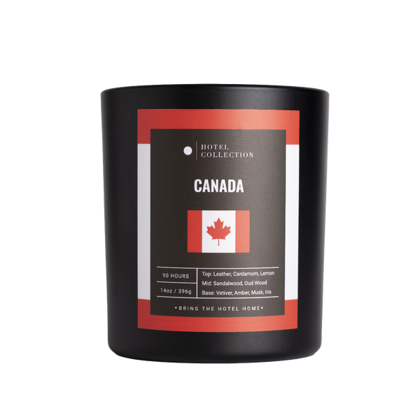 Black candle with a label featuring the Canadian flag on a white background