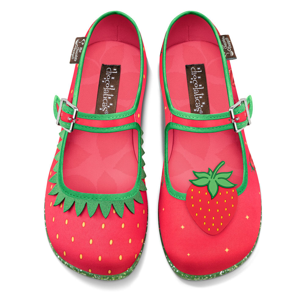 Chocolaticas® Berry Bliss Women's Mary Jane Flat - Red strawberry-themed shoes with green straps on a white background