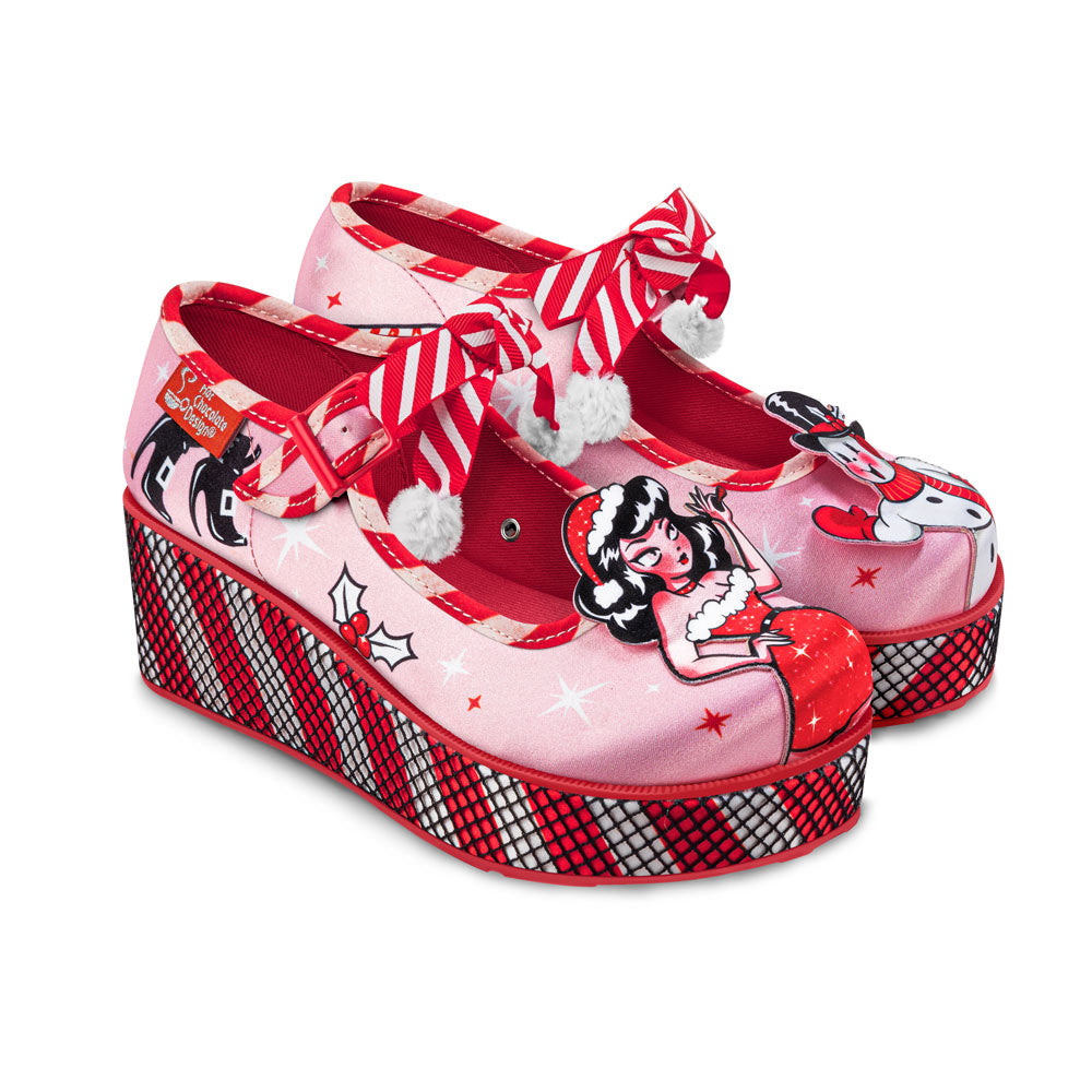 Chocolaticas® Betty Claus Women's Mary Jane Platform - Pair of red and pink platform shoes with cartoon character design on a white background