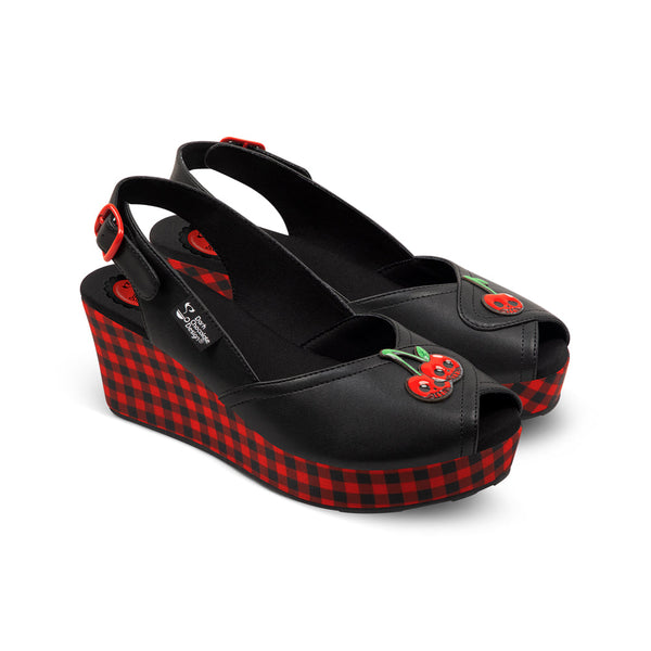Chocolaticas® Death Cherry Women's Sandal - Black wedge sandals with red plaid pattern and cherry details on a white background