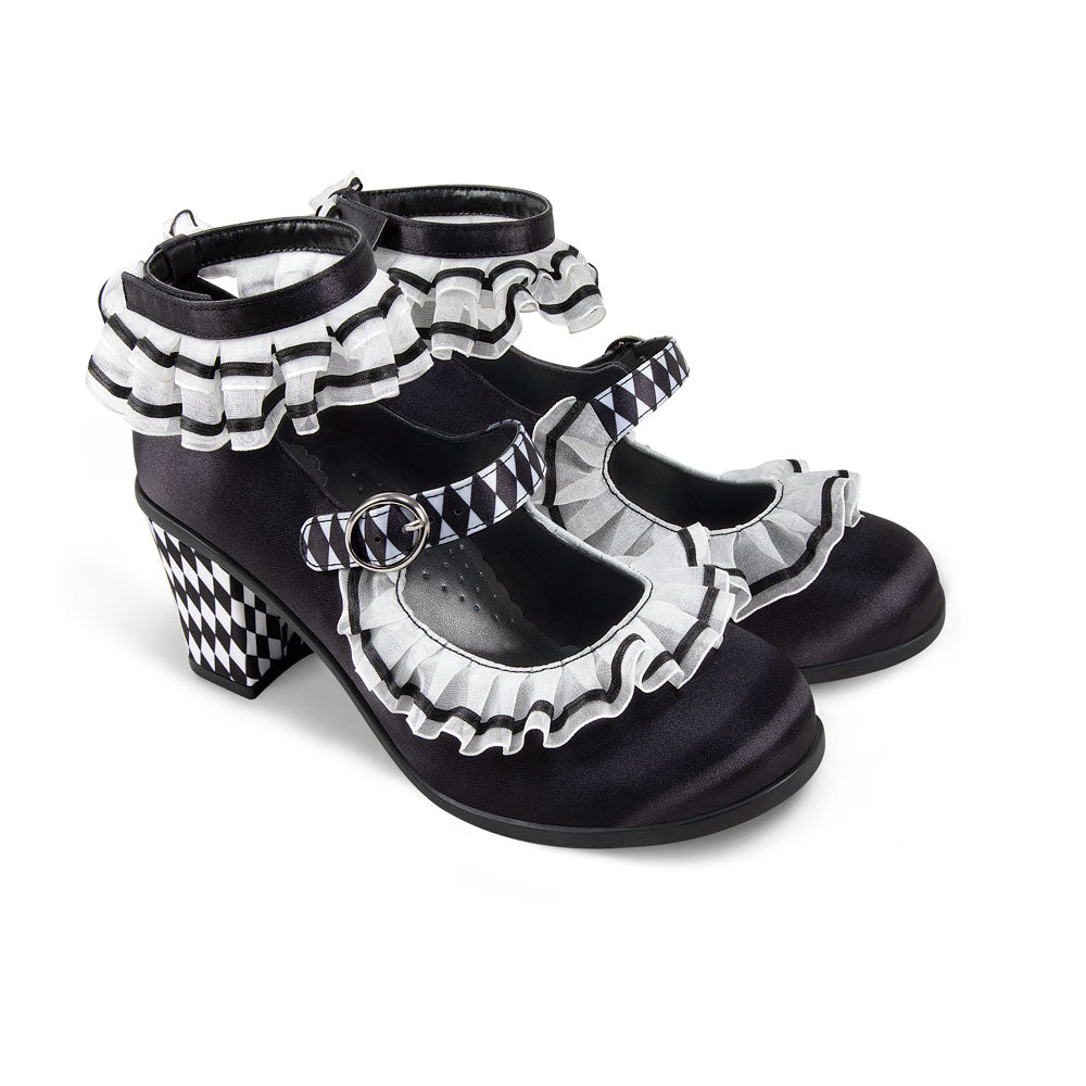 Chocolaticas® Mid Heels Arlequin Women's Mary Jane Pump - Black and white checkered shoes with ruffled details on a white background